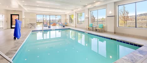 Indoor pool, open 6:00 AM to 10:00 PM, pool umbrellas, sun loungers