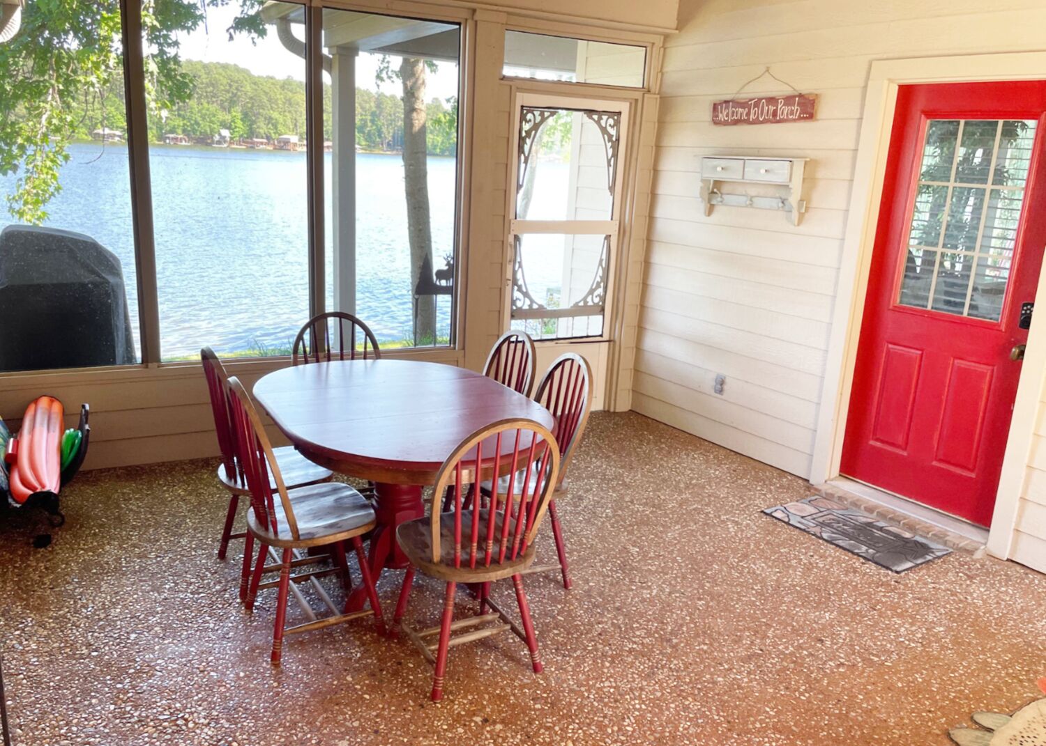 Screened porch with grill just outside
