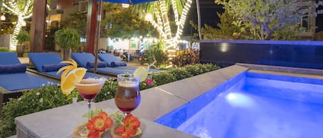 Outdoor pool, pool umbrellas, pool loungers