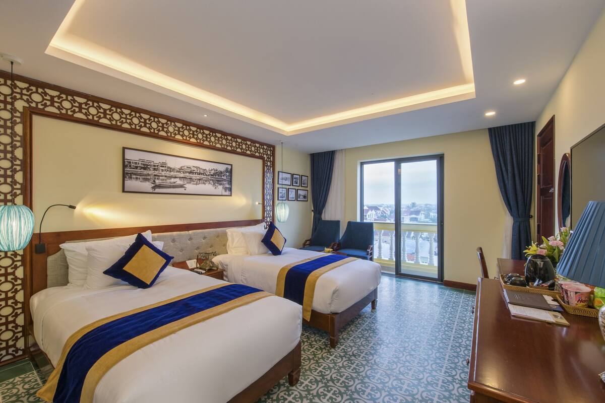 2 habitaciones, ropa de cama de alta calidad y minibar
