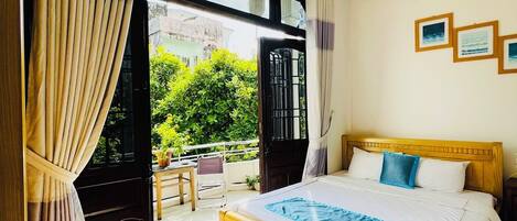 Double Room, Balcony | Minibar, in-room safe, desk, laptop workspace