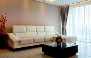 Apartamento família, 3 quartos | 3 quartos, roupas de cama premium, cortinas blackout, roupa de cama