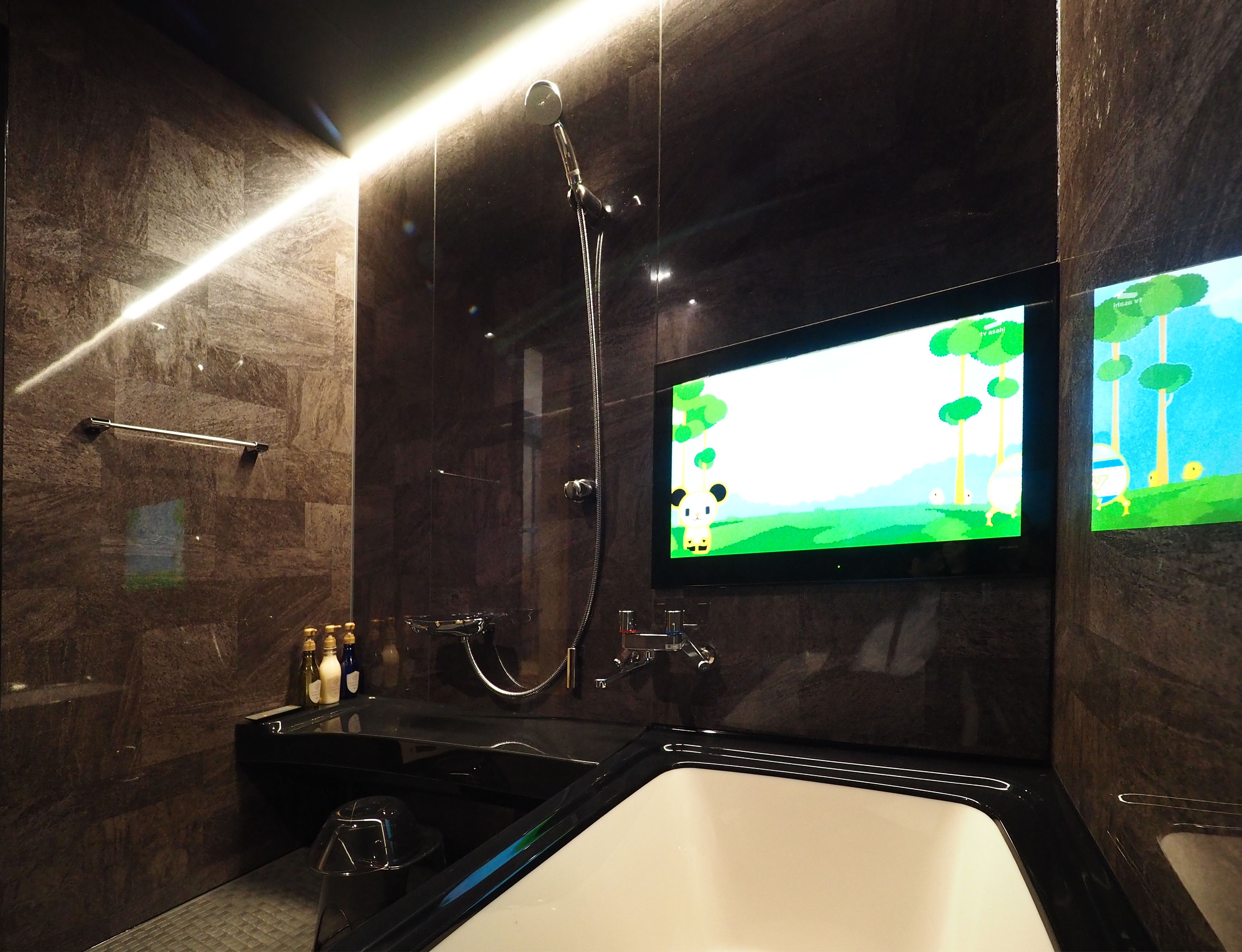 junior suite, private bathroom | bathroom | hair dryer, slippers, electronic bidet, towels