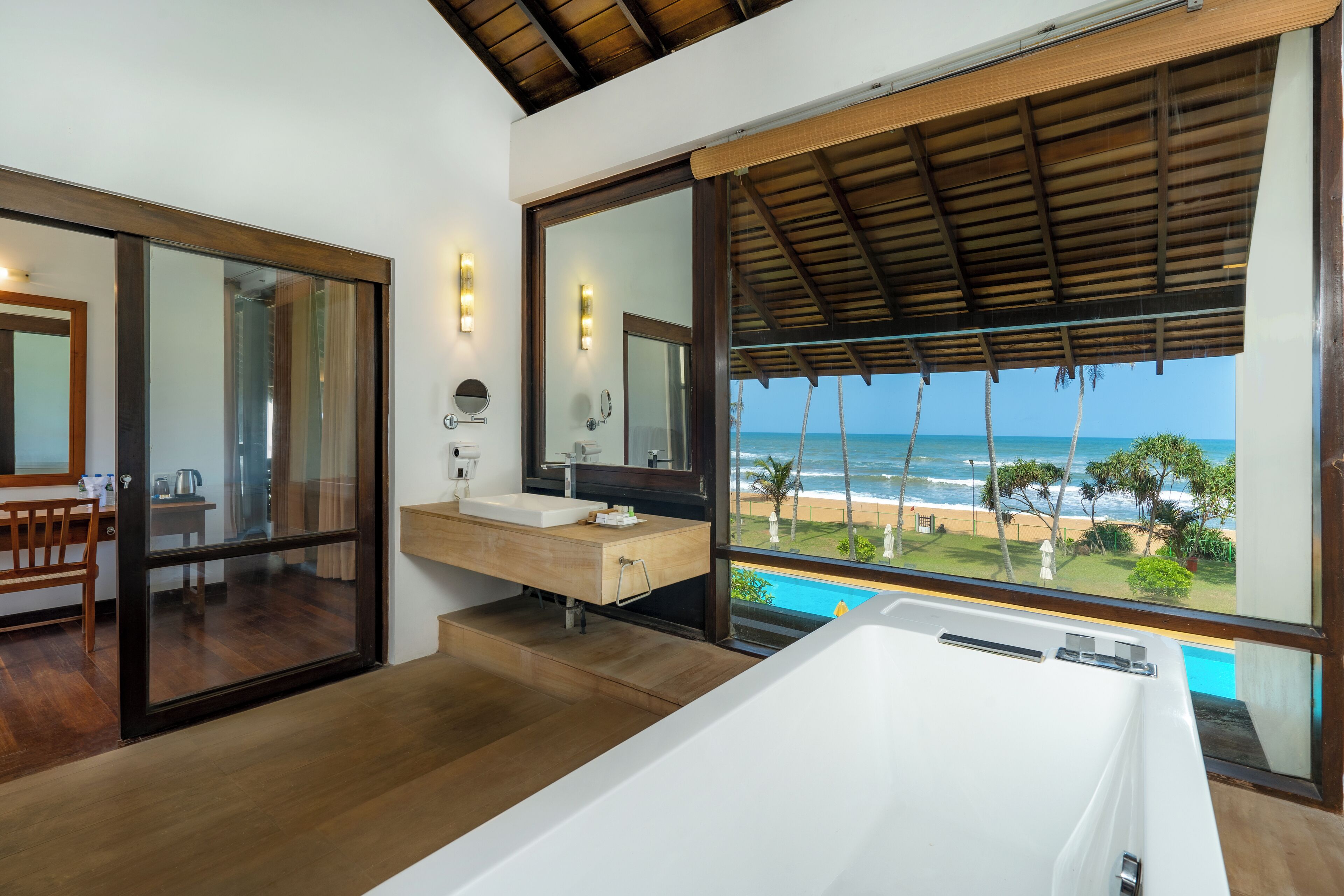 Suite, Ocean View | Bathroom | Shower, rainfall showerhead, free toiletries