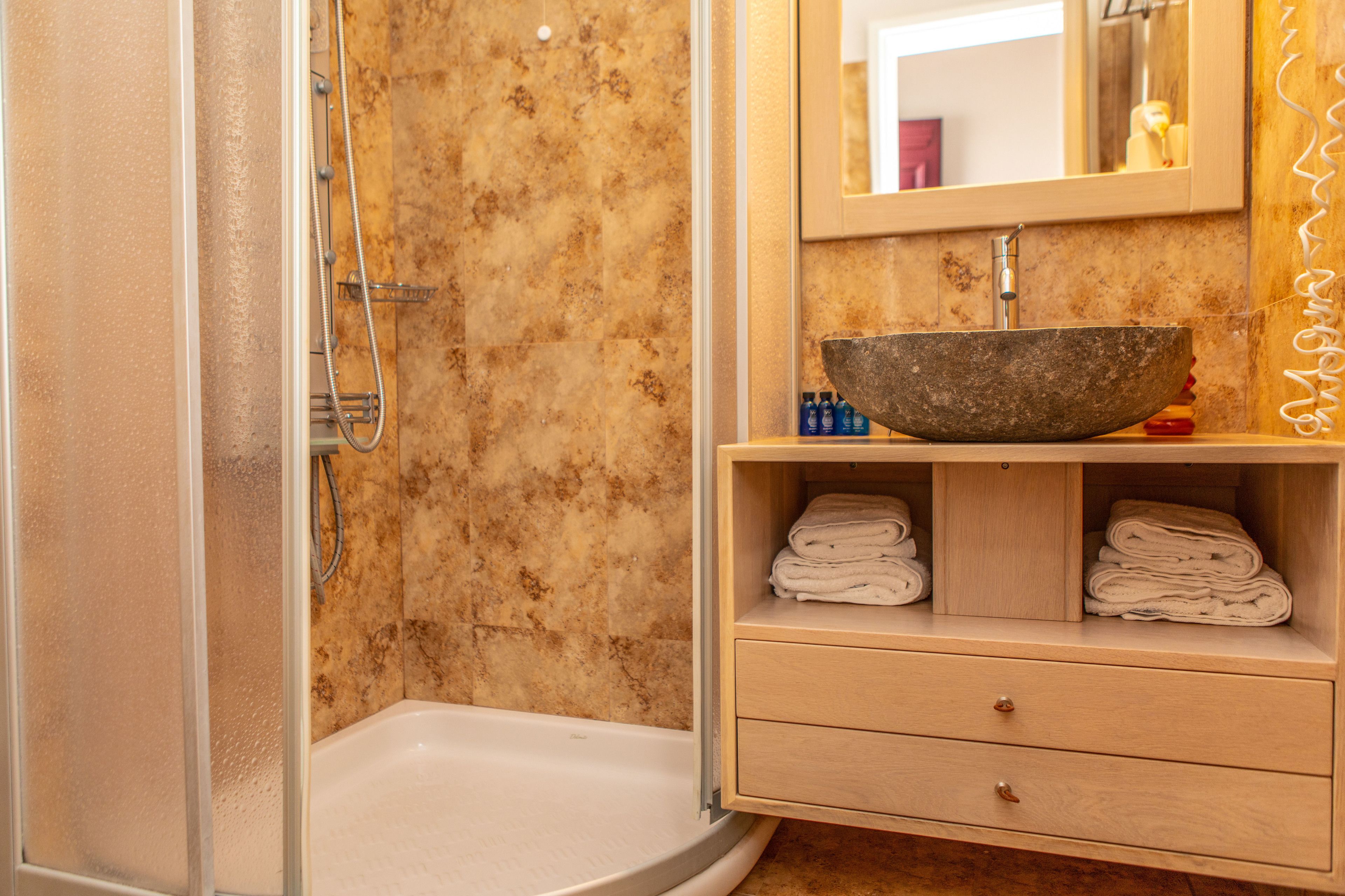 panoramic suite, sea view | bathroom | shower, free toiletries, towels