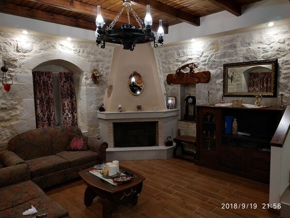 Luxury Villa, Multiple Beds, Terrace, Mountain View | Living area | LED TV, fireplace - Amazing Stone villa (Gortyna)