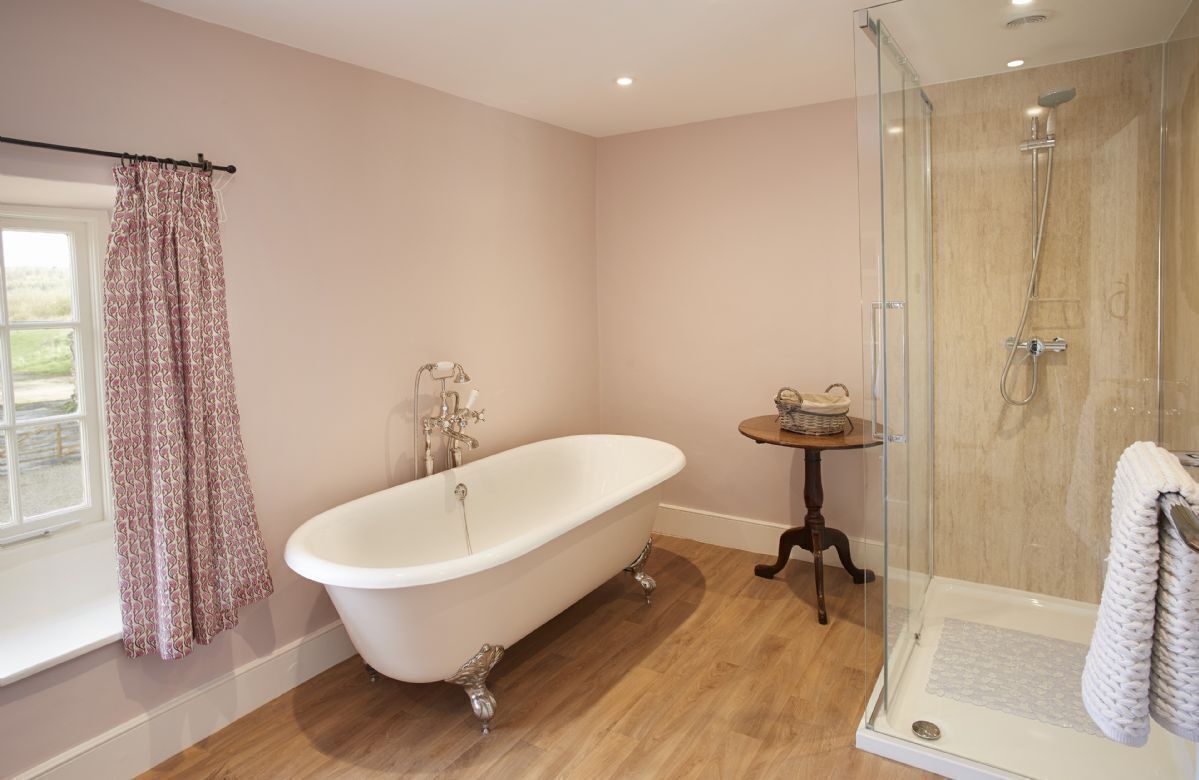First Floor: Master en-suite with beautiful roll top bath and spacious shower