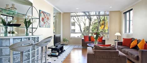 Apartment, 2 Bedrooms | Living room | Flat-screen TV, DVD player