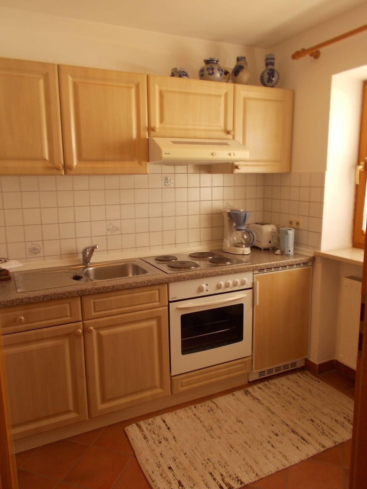 Een koelkast, een oven, een kookplaat