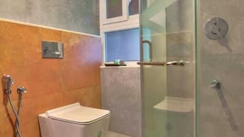 Shower, free toiletries, slippers, towels