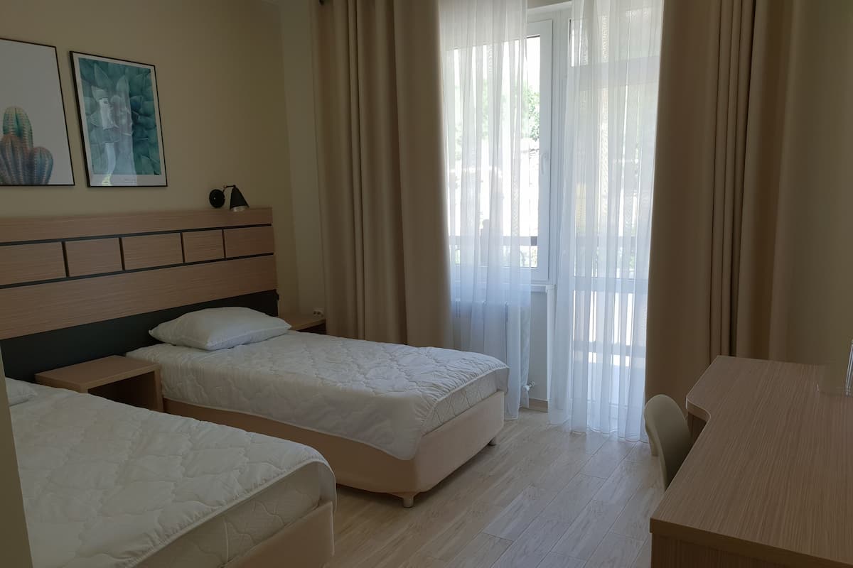 Kamar Twin Klasik, 1 kamar tidur | 1 kamar tidur, seprai premium, meja kerja, dan tirai kedap cahaya