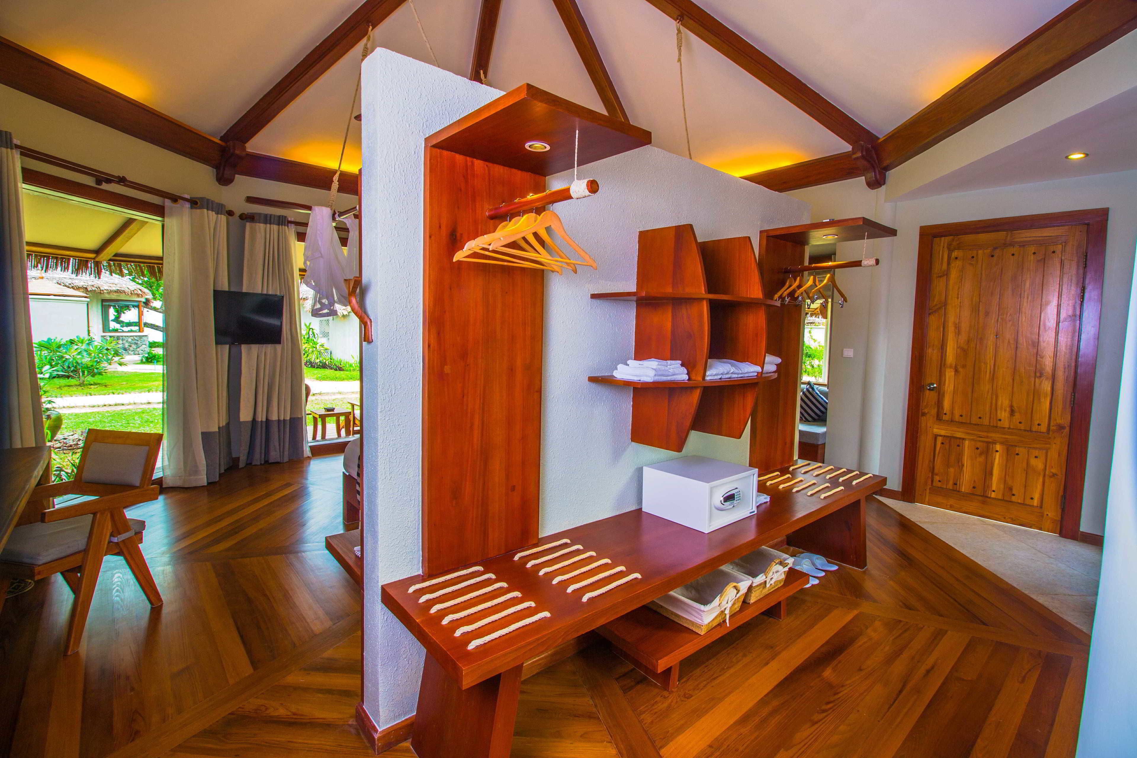 ngapali cottage with partial sea view | living area | flat-screen tv