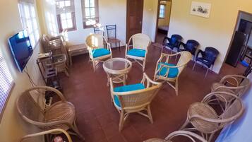 Family Triple Room, 1 Bedroom, Non Smoking, Garden View | Living area | Flat-screen TV