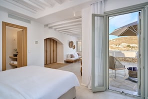 Beach Front Suite | Ropa de cama hipoalergénica y minibar 