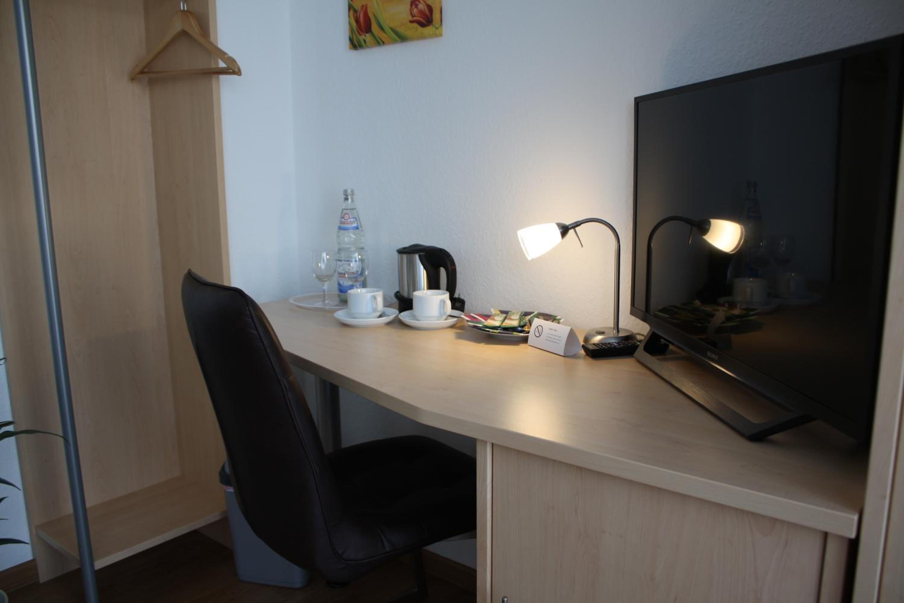 individually furnished, desk, laptop workspace, blackout curtains