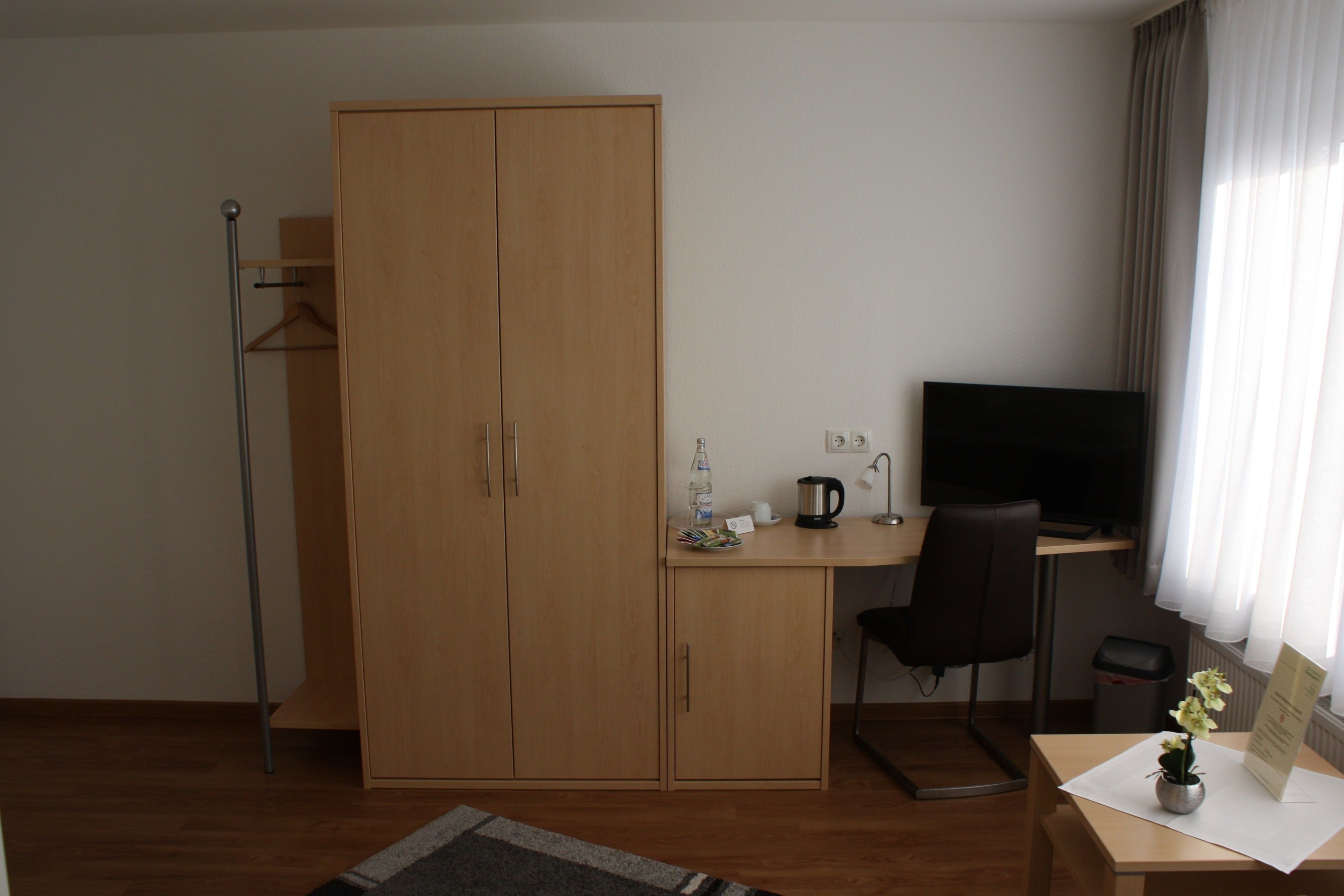 individually furnished, desk, laptop workspace, blackout curtains