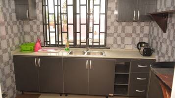 Apartment (Flat B) | Private kitchen | Full-size fridge, microwave, oven, stovetop