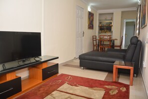 Apartment (Flat B) | Living area | Flat-screen TV - Flat 7 a and b (Lagos)