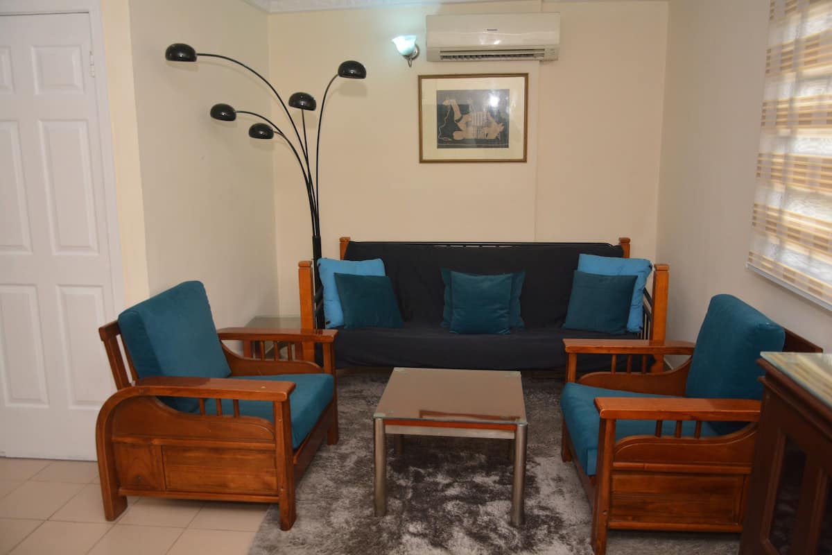 Apartment, 1 Bedroom (Flat A) | Living area | Flat-screen TV