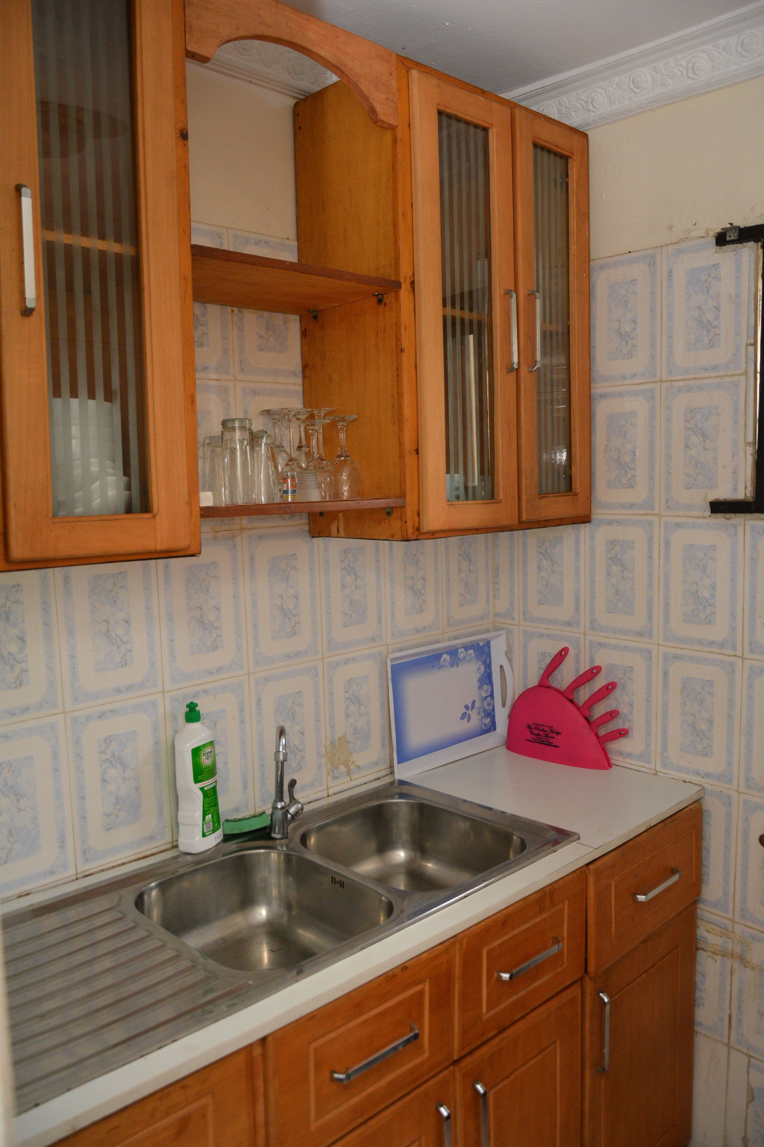 Apartment, 1 Bedroom (Flat A) | Private kitchenette | Full-size fridge, microwave, oven, stovetop