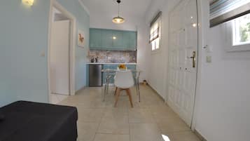 Deluxe Studio | Living room | Flat-screen TV