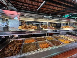 A buffet with various dishes including biryani, kottu, and other South Indian and Indian food options. - Hill Cool Hotel & Restaurant (Hatton)