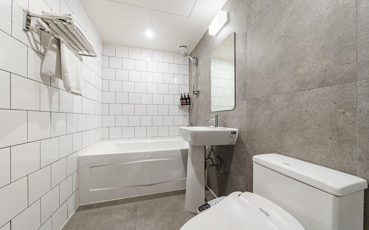 premier double room | bathroom | designer toiletries, hair dryer, dressing gowns, slippers