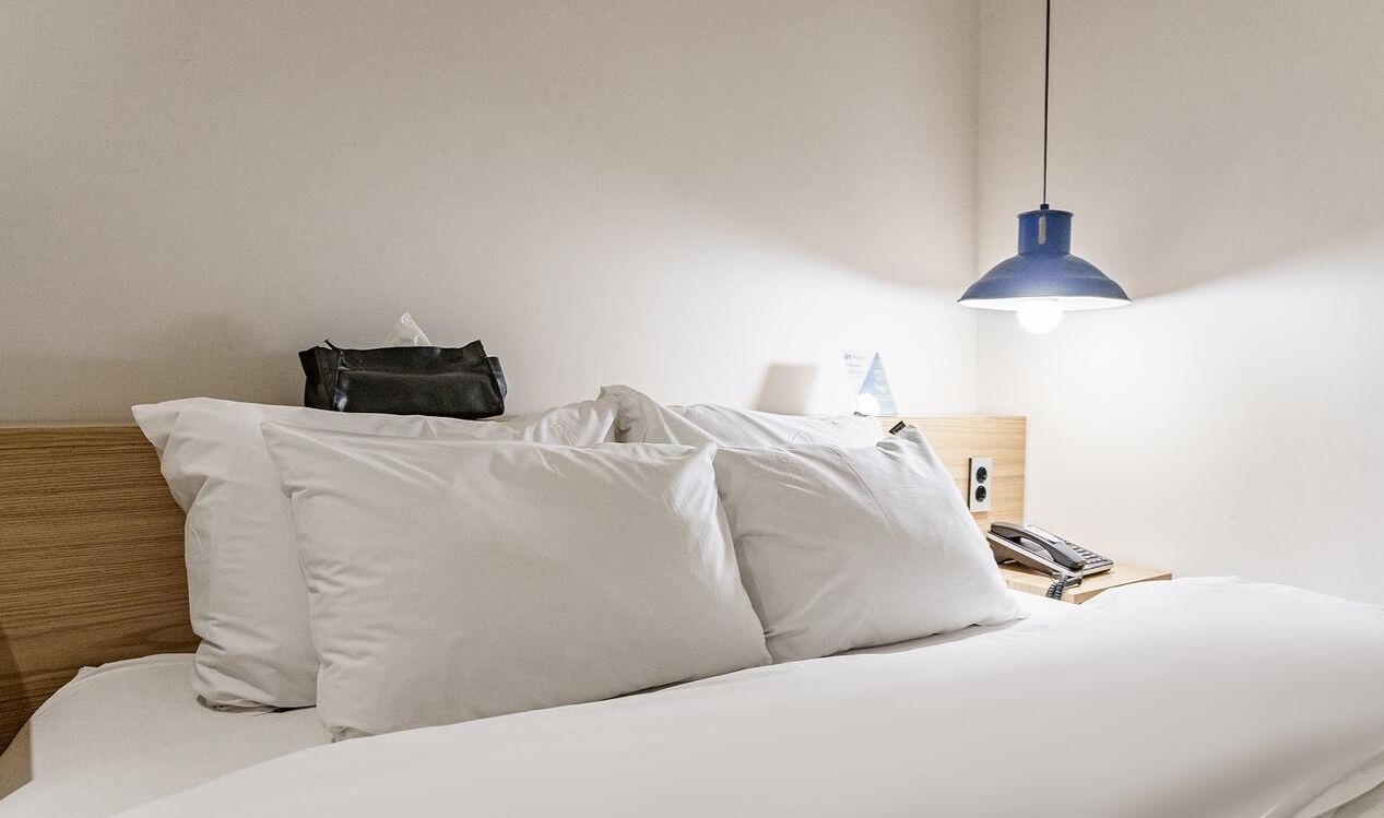 standard double room | premium bedding, down duvets, desk, laptop workspace