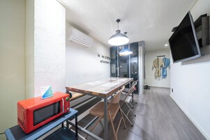 Family Quadruple Room, 2 Queen Beds | Premium bedding, down comforters, desk, laptop workspace