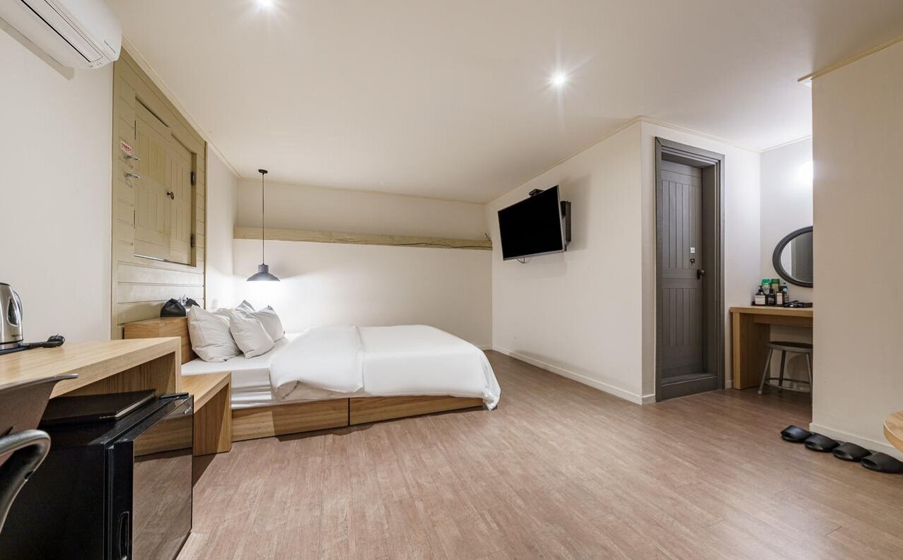 premier double room | premium bedding, down duvets, desk, laptop workspace