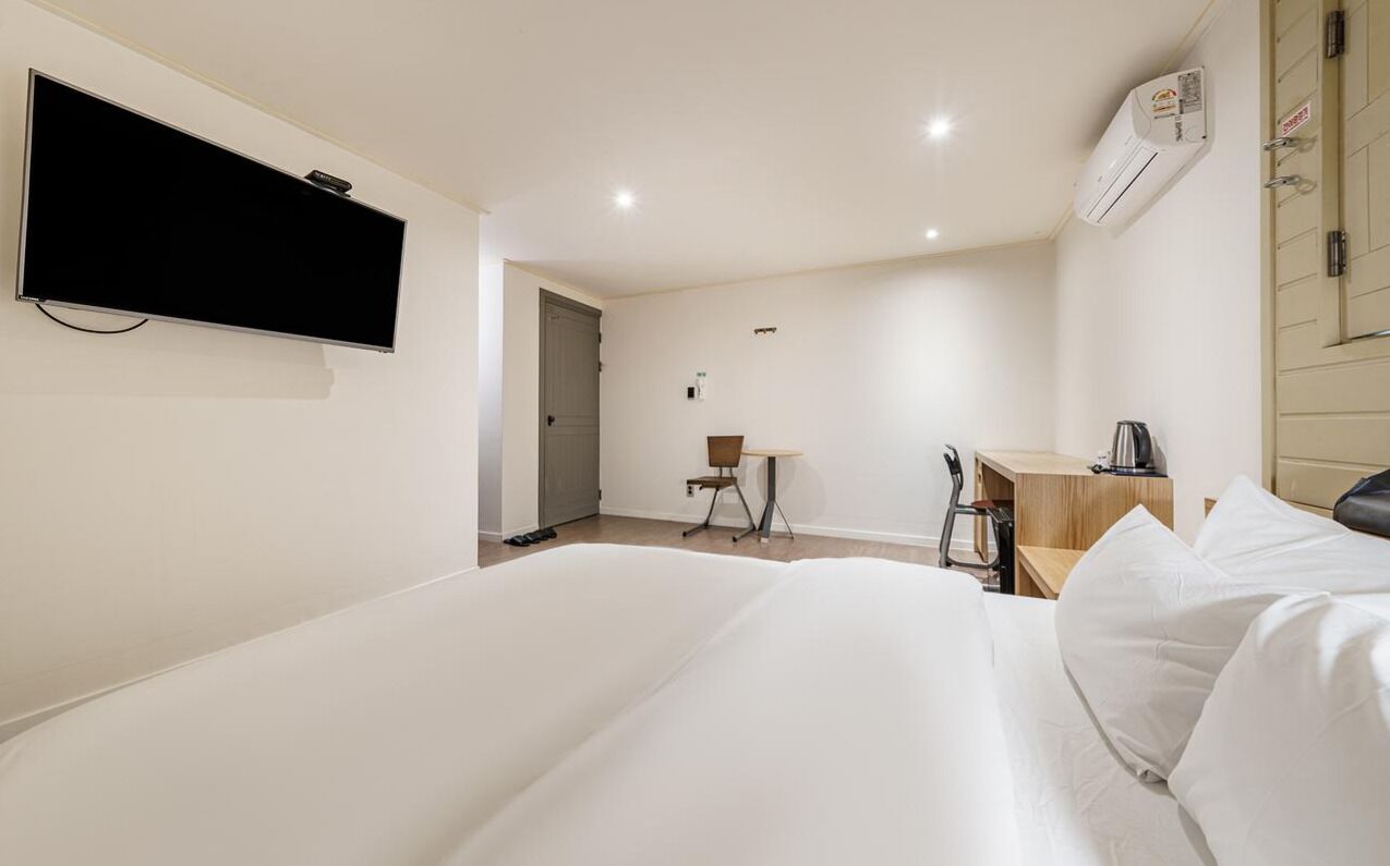 premier double room | premium bedding, down duvets, desk, laptop workspace