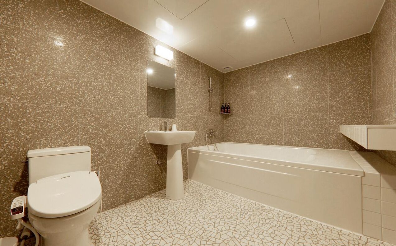 business triple room | bathroom | designer toiletries, hair dryer, dressing gowns, slippers