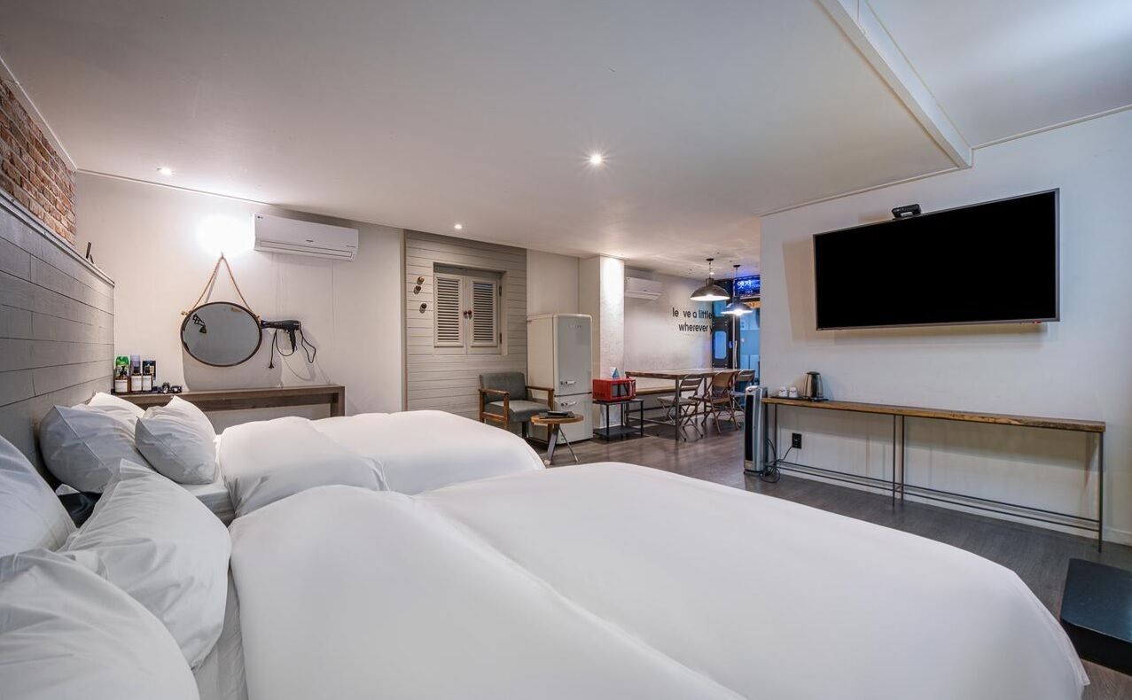 family quadruple room, 2 queen beds | premium bedding, down duvets, desk, laptop workspace