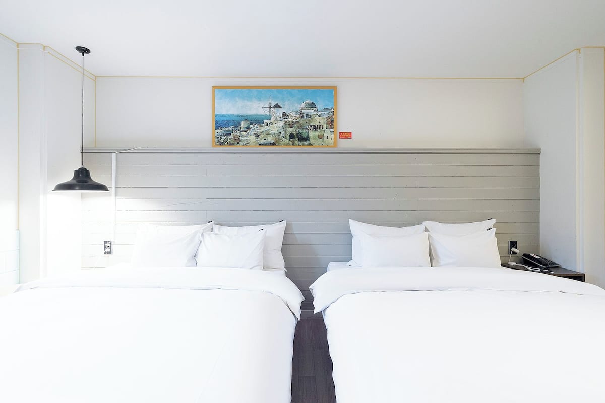 Premium bedding, down duvets, desk, laptop workspace