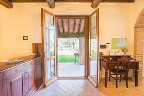 Classic Apartment, 3 Bedrooms | Living area | Flat-screen TV - Agriturismo Cantagalli (San Quirico d'Orcia)