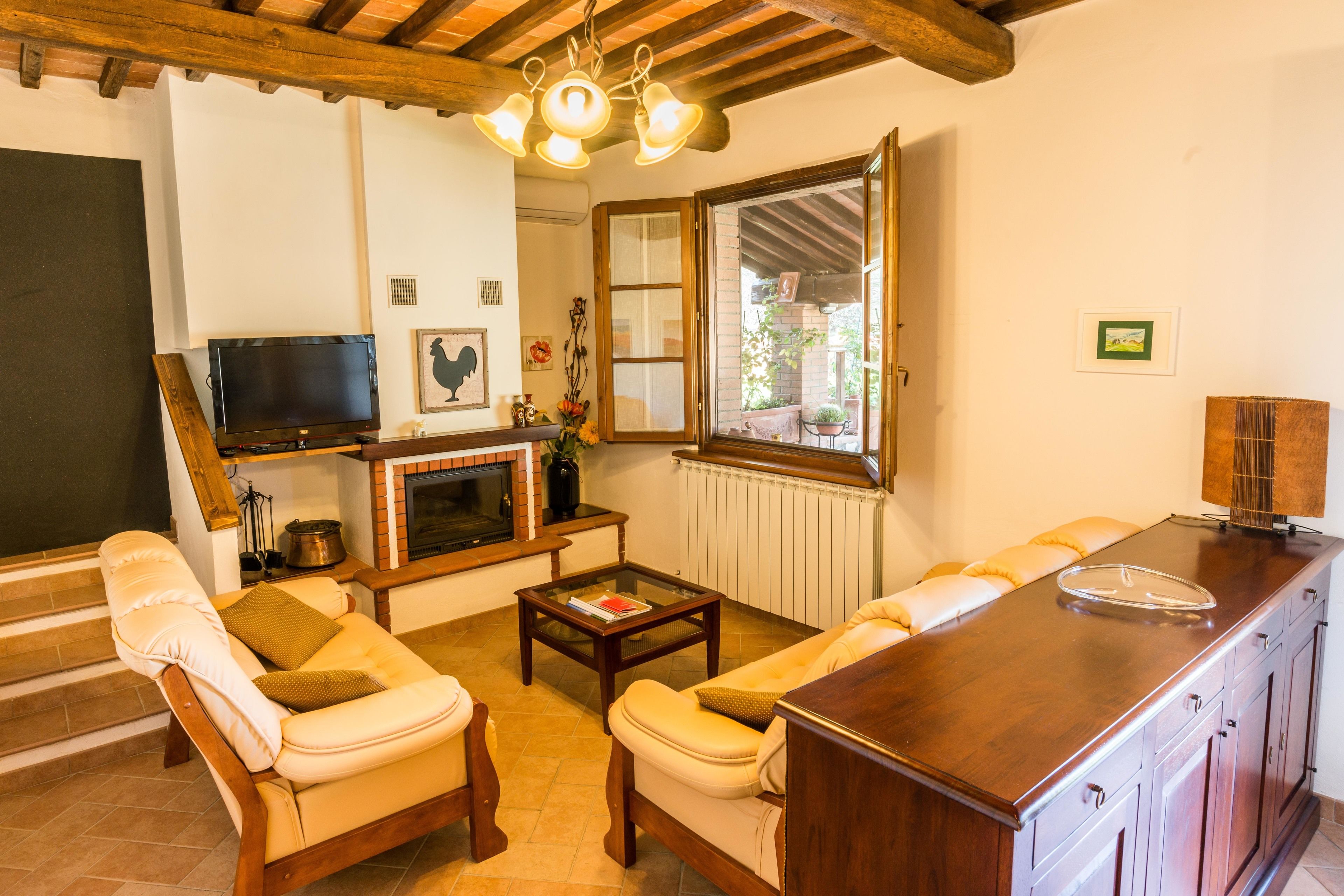 Classic Apartment, 3 Bedrooms | Living room | Flat-screen TV