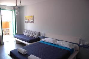 Kamar Triple, balkon | Minibar, Wi-Fi gratis, dan seprai linen