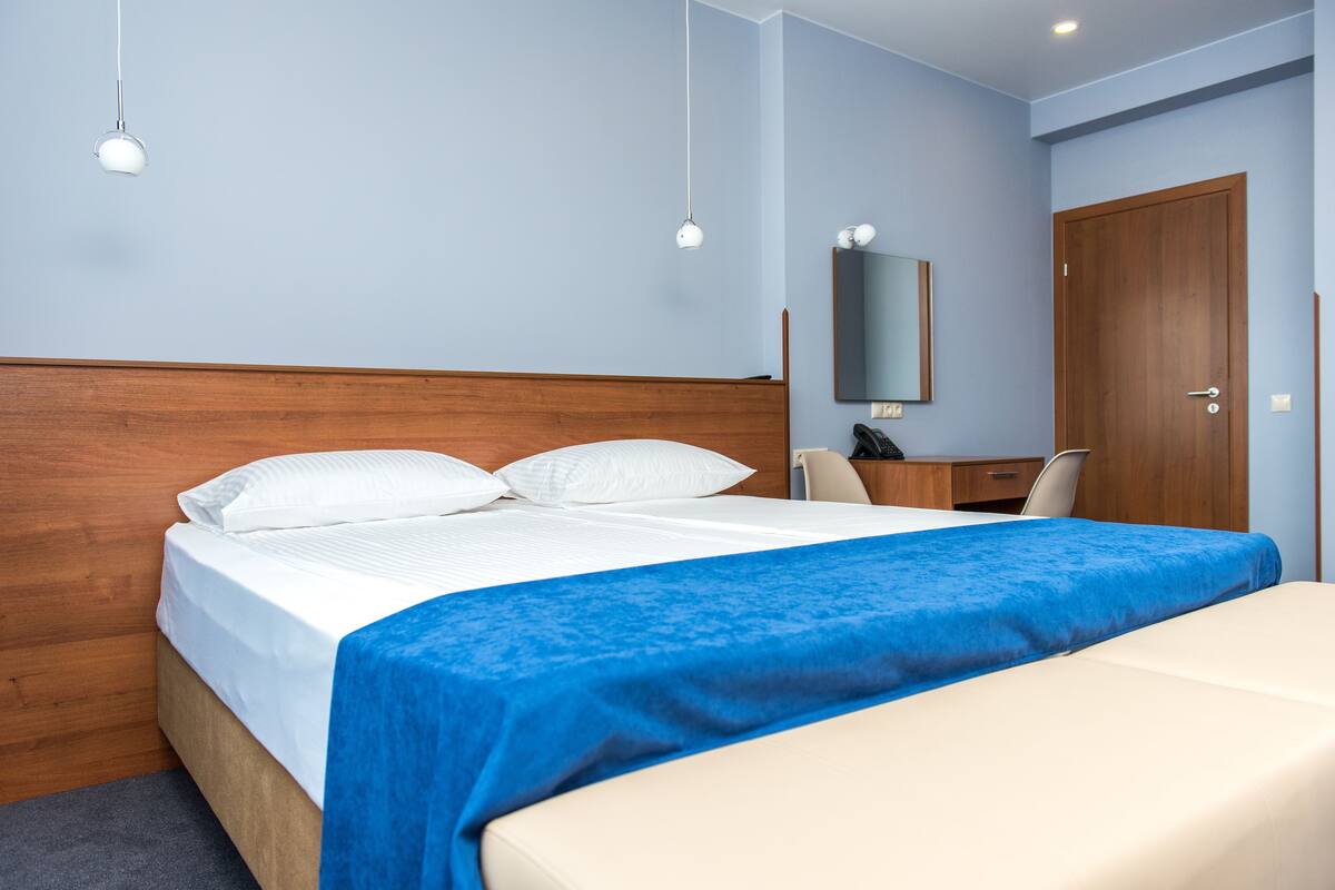 Premium bedding, down duvets, in-room safe, desk