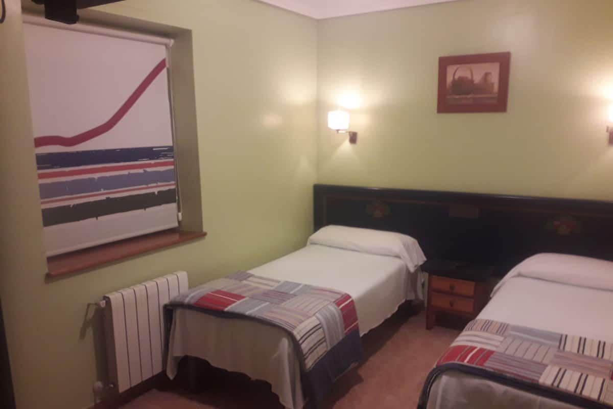 Economy Twin Room, Courtyard View | Premium bedding, down duvets, individually decorated, desk