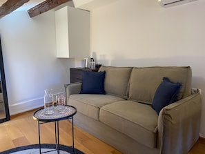 Suíte urbana, 1 cama Queen e sofá-cama | Roupas de cama premium, frigobar, cofres nos quartos, escrivaninha