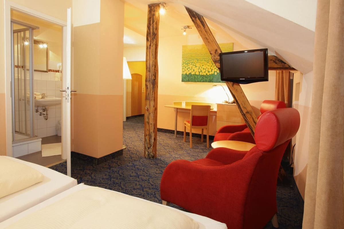 premium bedding, desk, iron/ironing board, cots/infant beds