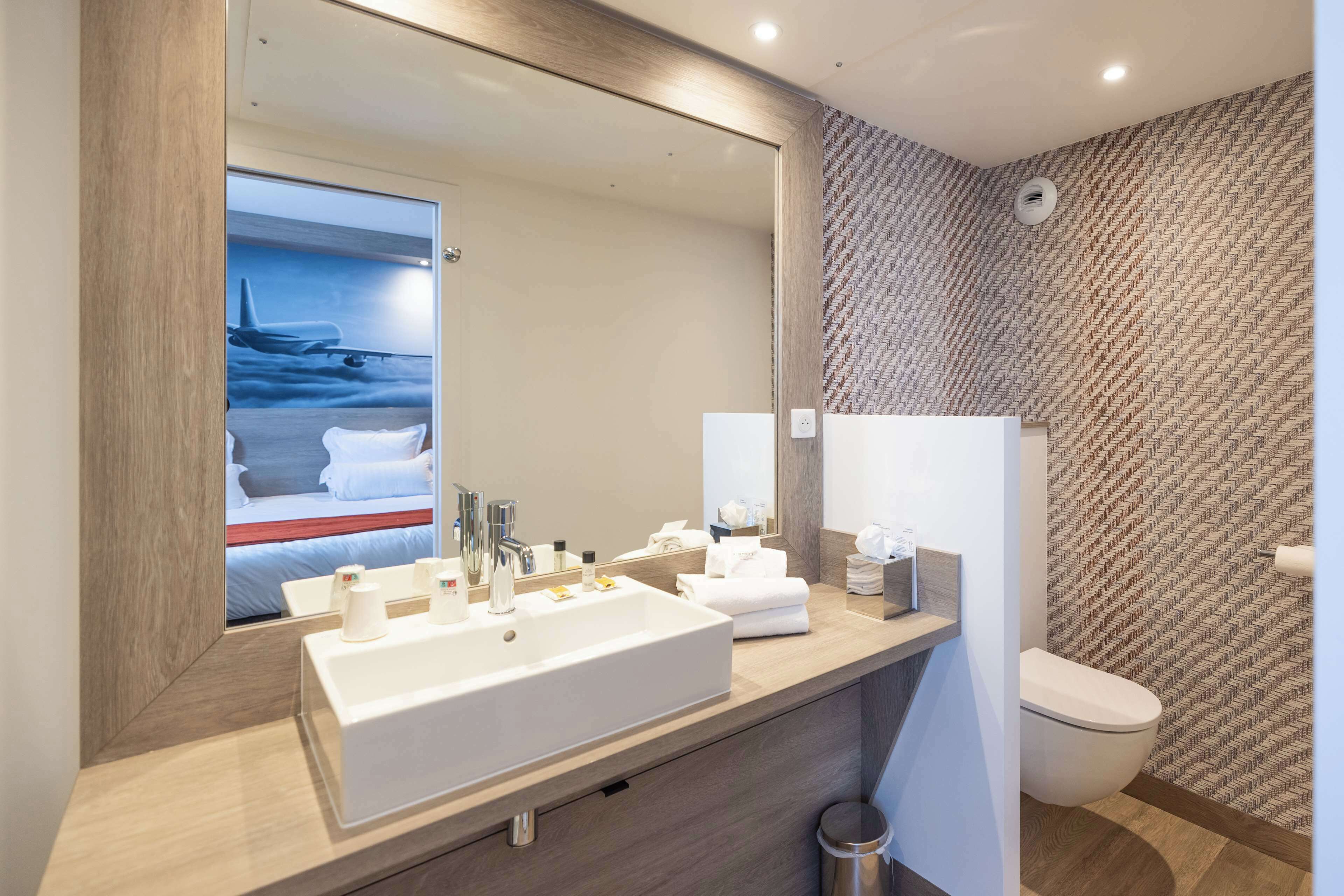 Shower, rainfall showerhead, hair dryer, towels