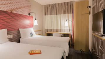 Apartemen Standar, 2 Tempat Tidur Twin | Seprai premium, meja kerja, kedap suara, dan Wi-Fi gratis