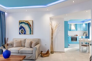 Deluxe Apartment, 1 Double Bed, Non Smoking, Mountain View | Living area | 42-inch flat-screen TV with satellite channels, TV - Theoxenia Suites & Apartments (Kasos)