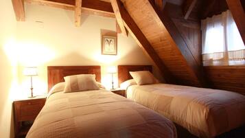 4 slaapkamers, een strijkplank/strijkijzer, beddengoed