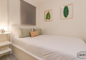 1 dormitorio, tabla de planchar con plancha, Internet y ropa de cama