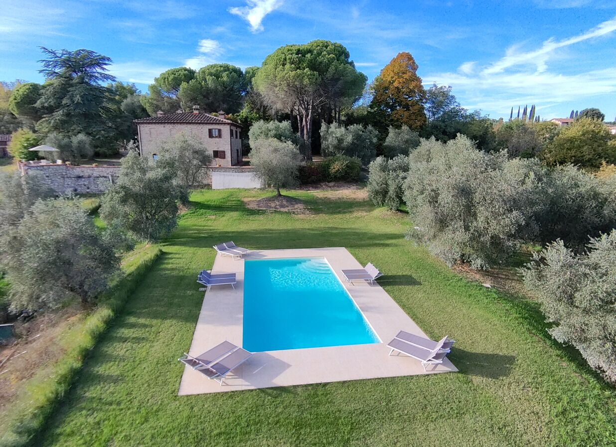 Seasonal outdoor pool, pool umbrellas, pool loungers