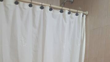 Triple Room, Multiple Beds, Private Bathroom (AirCon Room) | Bathroom | Shower, free toiletries, towels