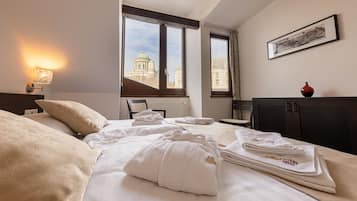 Suíte design, 1 quarto, banheira, vista para a cidade | 1 quarto, roupas de cama premium, camas Select Comfort, frigobar