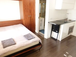 Apartamento | Zona de estar | Una televisión de pantalla plana